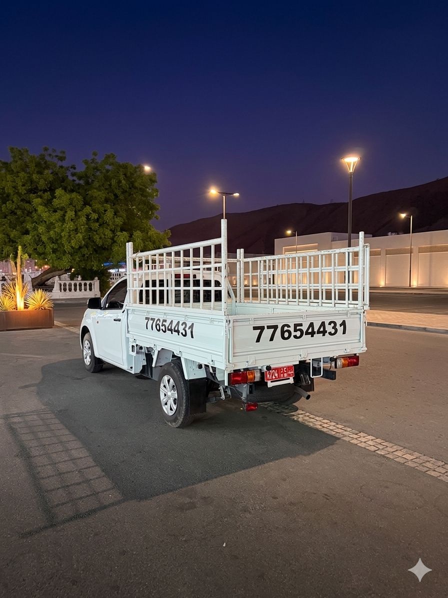 Aziz General Transportation truck at night in Oman ready for moving service